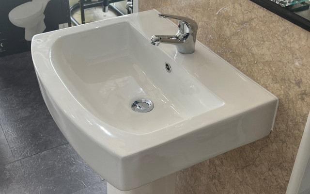 Basin with one tap hole, showcasing modern design and functionality.